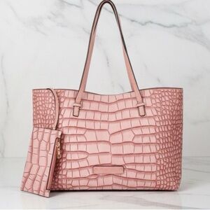 De Vesi Elegant Pink Crocodile-Embossed Tote Bag
NWT with dust cover bag also